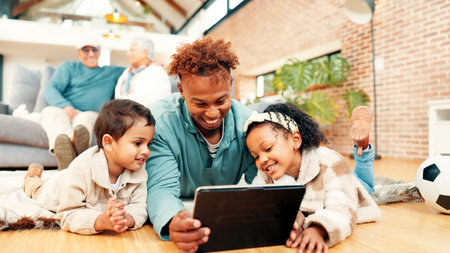 Happy family, dad and children with tablet on floor for entertainment, movie or education in home....