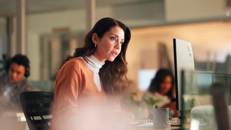 Night, woman or worry with computer in office. Late, concerned writer or coworking with pc....