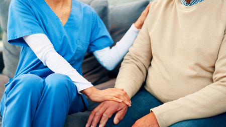 Nursing home, empathy and nurse with patient, hands and medical help for rehabilitation and comfort....