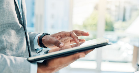 Employee, planning and hands with tablet in office, accountant or scroll for tax preparation or info. Browsing, research and person with technology for financial records, audit and filing returnsの写真素材