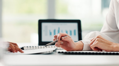 Hands, documents and business people in meeting for feedback, performance review and paperwork. Report graphs, sales planning and manager with budgeting portfolio for employee in financial officeの写真素材