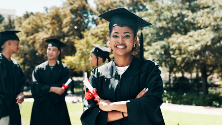 Happy woman, portrait or student with graduation for qualification, education or learning in nature. Female person, graduate or smile with certificate, degree or diploma for academic milestoneの写真素材