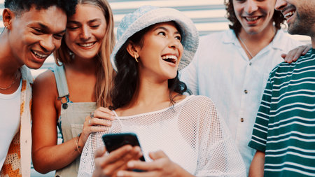 Phone, friends laugh and people outdoor for social media, connectivity or share meme. Funny, men and women with mobile for chat, joke and networking together for online communication with groupの写真素材