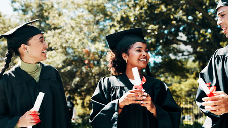 Happy people, certificate and graduation with qualification on campus for education or learning. Group, students or graduates with smile, degree or diploma for academic milestone or achievementの写真素材