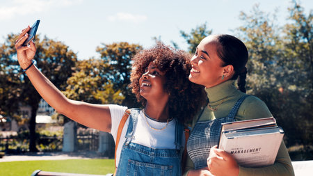 Education, selfie and smile with women outdoor on college campus for memories or social media. App, books and photograph with happy student friends at university for profile picture post or updateの写真素材