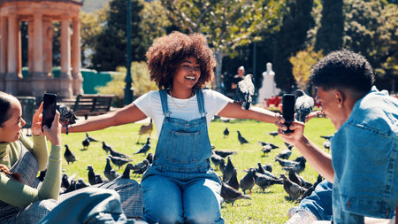 Phone, photograph and pigeons on woman at campus for education, magic moment or memories. App, birds and profile picture with happy student outdoor at college or university for social media postの写真素材