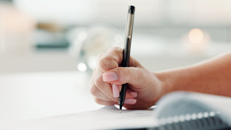 Woman, hand and sign document in office with insurance agreement, terms and conditions for compliance. Bokeh, person or writing in workplace with contract signature, financial service policy or plan.の写真素材