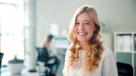 Agency, portrait and smile of business woman in coworking office for job satisfaction or opportunity. About us, confident and proud with happy employee person at work for professional developmentの写真素材