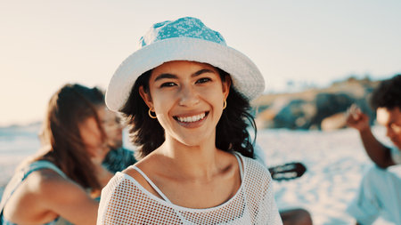 Beach, friends and portrait with happy woman outdoor in nature for bonding, summer fun or trip. Break, smile and vacation with group of people on shore at coast for holiday, travel or weekend getawayの写真素材
