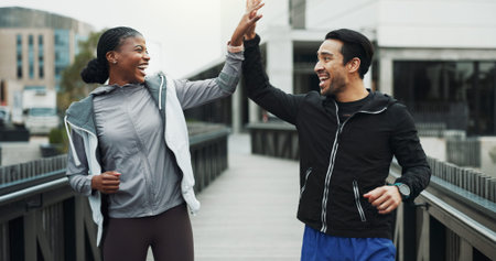 Runner, people and high five with smile in city for fitness progress, race training or teamwork....