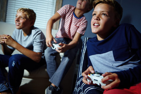 Video game, challenge or siblings on couch with controller, playful contest or competition in...