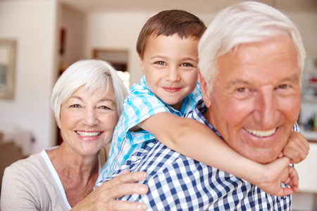 Smile, portrait and grandparents with kid in home on weekend for bonding, love and family. Happy,...