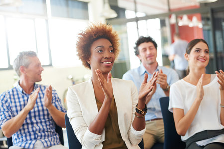 Happy people, meeting or presentation with applause for team speech, workshop or staff training. Group, employees or colleagues clapping with smile for work seminar or convention support in workplaceの写真素材