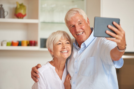 Selfie, happy and senior couple hug in home for memory, profile picture and bonding in kitchen....