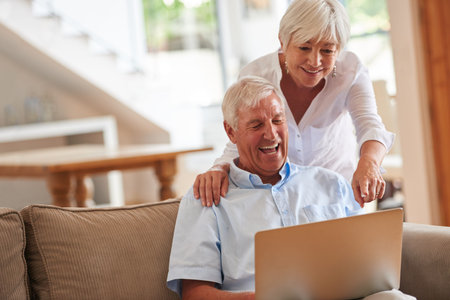 Home, smile and old couple with laptop, funny and reading with website information. Laughing,...