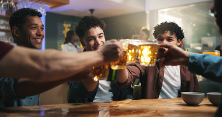 Friends, men and cheers with beer in bar for reunion celebration, night out and bonding. Happy hour,...