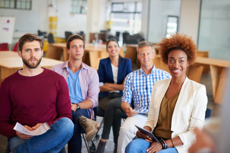Presentation, collaboration and business people in office with meeting for planning creative project. Startup, discussion and magazine editors listening at publishing seminar in workplace with team.の写真素材