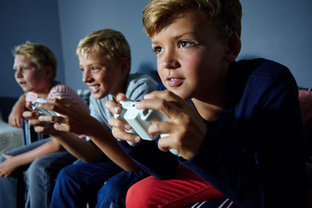 Gaming, friends and teens on sofa in home for playing, competition and online entertainment....