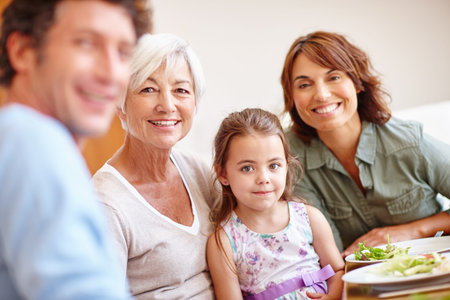 Food, portrait and smile with family at lunch for bonding, nutrition and thanksgiving event....