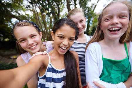 Happy girl, portrait and children with selfie in nature for bonding, outdoor fun or weekend....