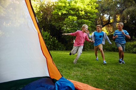 Camping, kids and happy with running in nature for travel adventure, fun holiday or bonding...