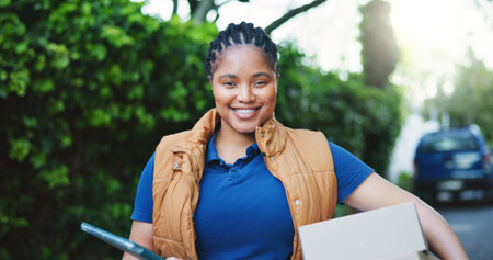 Tablet, delivery service and portrait of black woman outdoor with box for logistics with cargo...