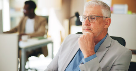 Thinking, ceo and man in office, serious and plan for investment opportunity, ambition and corporate. Investor, vision and mature person with glasses, reflection and ideas for business developmentの写真素材