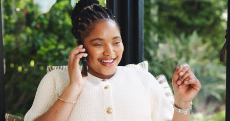 Phone call, smile and thinking with black woman in home living room for chatting or conversation....