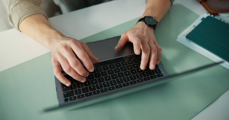 Top view, typing or hands in office with laptop, research or online communication on email app....