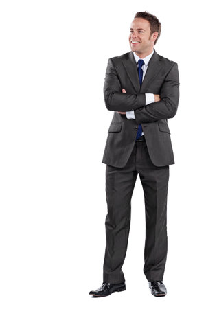 Crossed arms, thinking and businessman in studio with pride for corporate legal career. Happy, professional and male attorney in suit with confidence for job by white background with mockup space.の写真素材