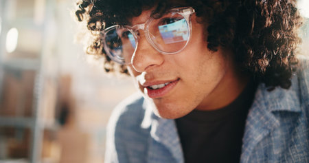 Distribution, reflection and man in workplace, glasses and online reading with email. Person, supply chain and employee in office, eyewear or clear vision with blue light exposureの写真素材