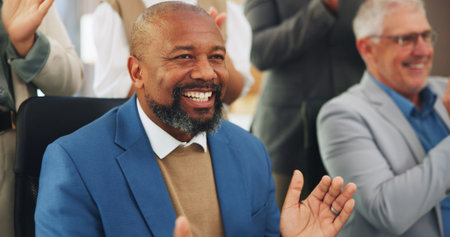 Excited, men and applause for presentation, success and celebration for training session or meeting. Happy, audience and clapping for achievement in seminar, collaboration and listening to speechの写真素材