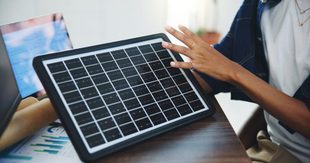 Review, solar panel or hands in office with model, feedback or plan for energy pitch. Sustainable,...