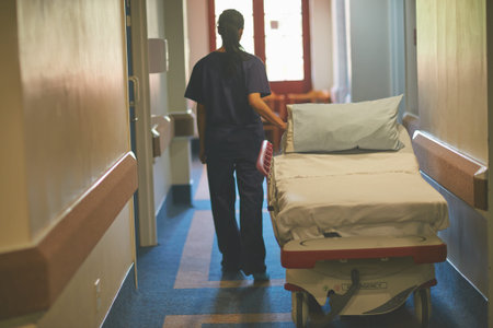 Nurse, gurney and walking with of woman in hospital for icu unit, medical bed and emergency support....