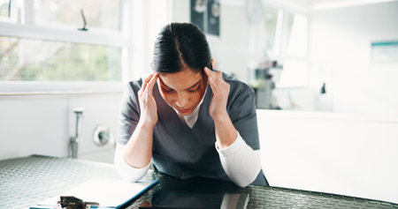 Veterinarian, headache and woman with pain, burnout and overworked with pressure. Person,...