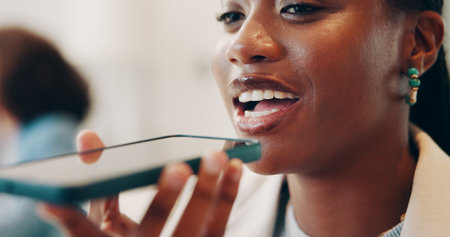 Media agency, phone call and woman in office, loudspeaker and communication with online interview. Person, employee and journalist in workplace, smartphone and conversation with contact or connectionの写真素材