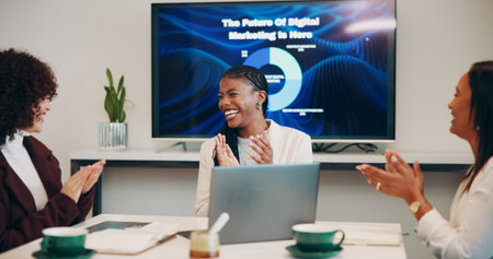 Woman, presentation and applause at startup, office meeting or goal with screen at digital marketing company. People, team and celebration for success, clapping or achievement for future at agencyの写真素材