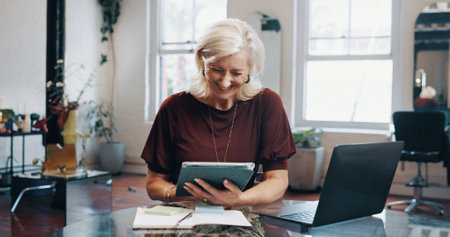 Mature woman, tablet and happy at salon with booking, appointment and scroll checklist for grooming...