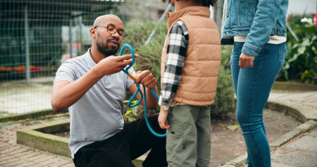 Animal shelter, parents and child with leash outdoor for adoption, foster care and learning tips....