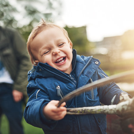Smile, tractor or child learning to farm for sustainability and field work with development, parent and fun. Education, playing or farmer with boy in training for growth or happy kid in agricultureの写真素材