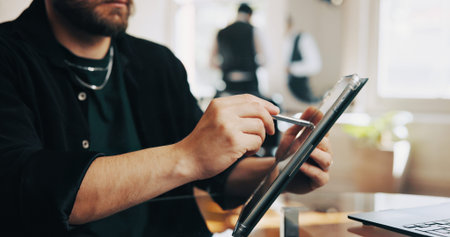 Hairdresser, salon and hands of man on tablet for online inventory, client appointment and schedule....