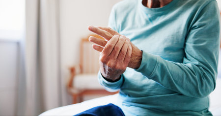 Senior person, massage and hand pain at house from arthritis, carpal tunnel and muscle inflammation....