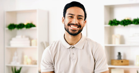 Portrait, happy man and massage therapist in spa for health, wellness center or about us in resort. Confidence, person or masseur at salon for healing service, holistic expert or therapy professionalの写真素材