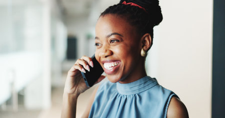 Happy, business and black woman with phone call in office for consultation, real estate and contact client. Smile, relator and mobile for discussion, property negotiation and buyer inquiry with offerの写真素材