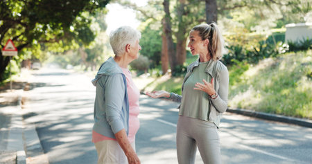 Senior, women or discussion with personal trainer in road for workout routine or exercise together....