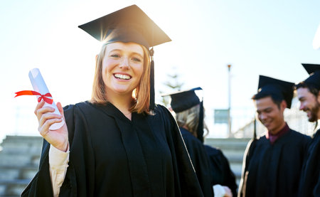 Portrait, students and woman with diploma, graduation and achievement with success, sunshine and...