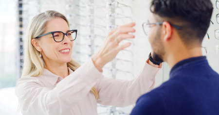Optometry, decision or people in shop with glasses, variety or assistance in eyewear option....
