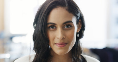 Internship, portrait or woman in office with smile, pride or professional growth in workplace goals. Confidence, about us or employee in agency with new job, work or opportunity in career developmentの写真素材