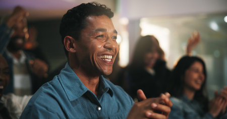 Fans, man and clapping with celebration in pub for match goal, public screening and entertainment. Sports event, happy people and applause in bar for soccer tournament, live broadcast or winning gameの写真素材