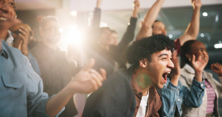 Fans, man and shouting with celebration in pub for match goal, team victory or entertainment. Flare, game supporters or cheering in sports bar for soccer tournament, live broadcast or competition winの写真素材